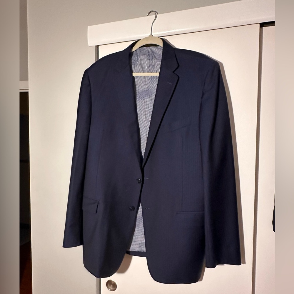Custom Jos A Bank suit with fabric from Ermenegildo Zegna.